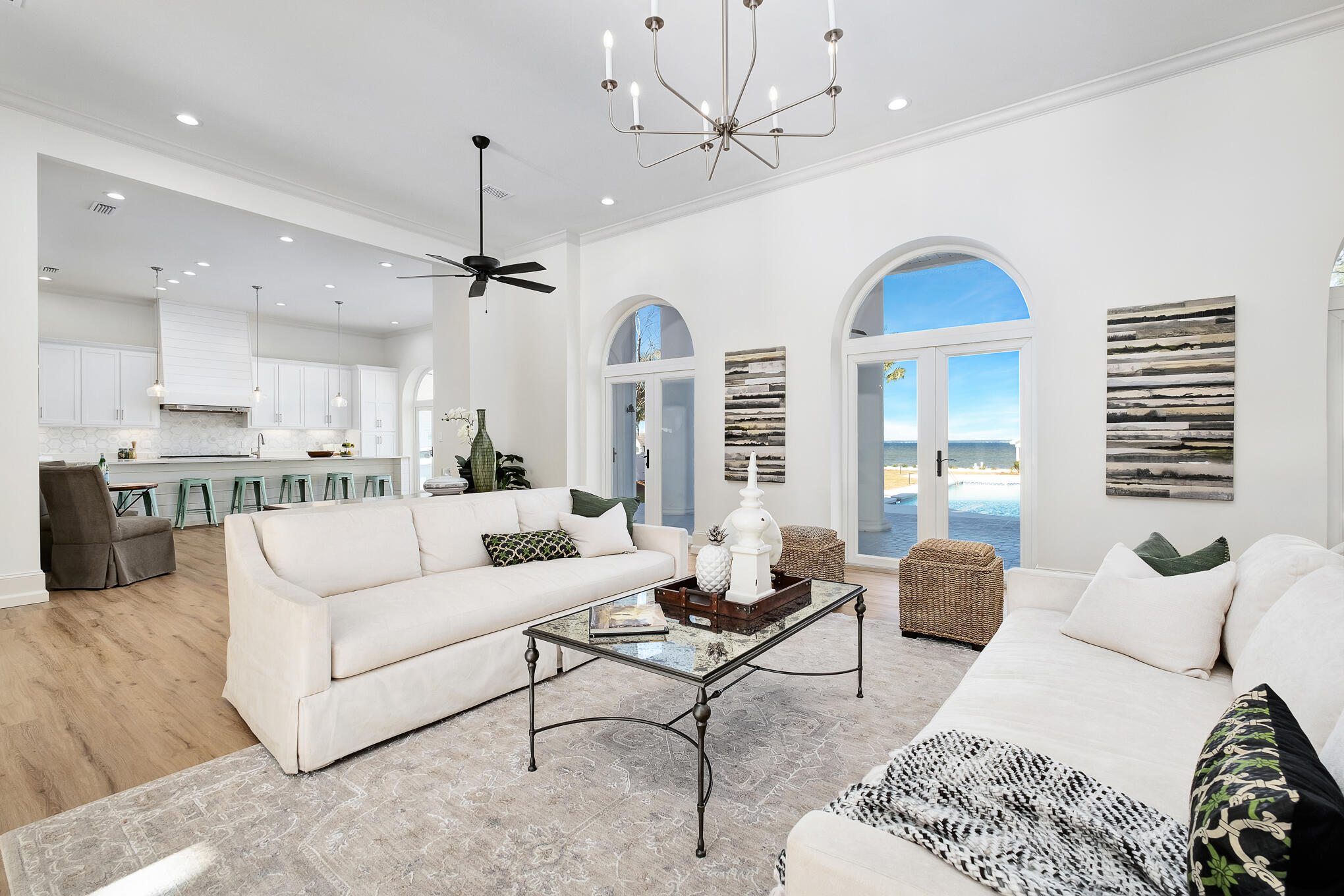 4105 Indian Trail Destin, FL 32541 - Photo 11 of 70 a living room with furniture kitchen view and a chandelier