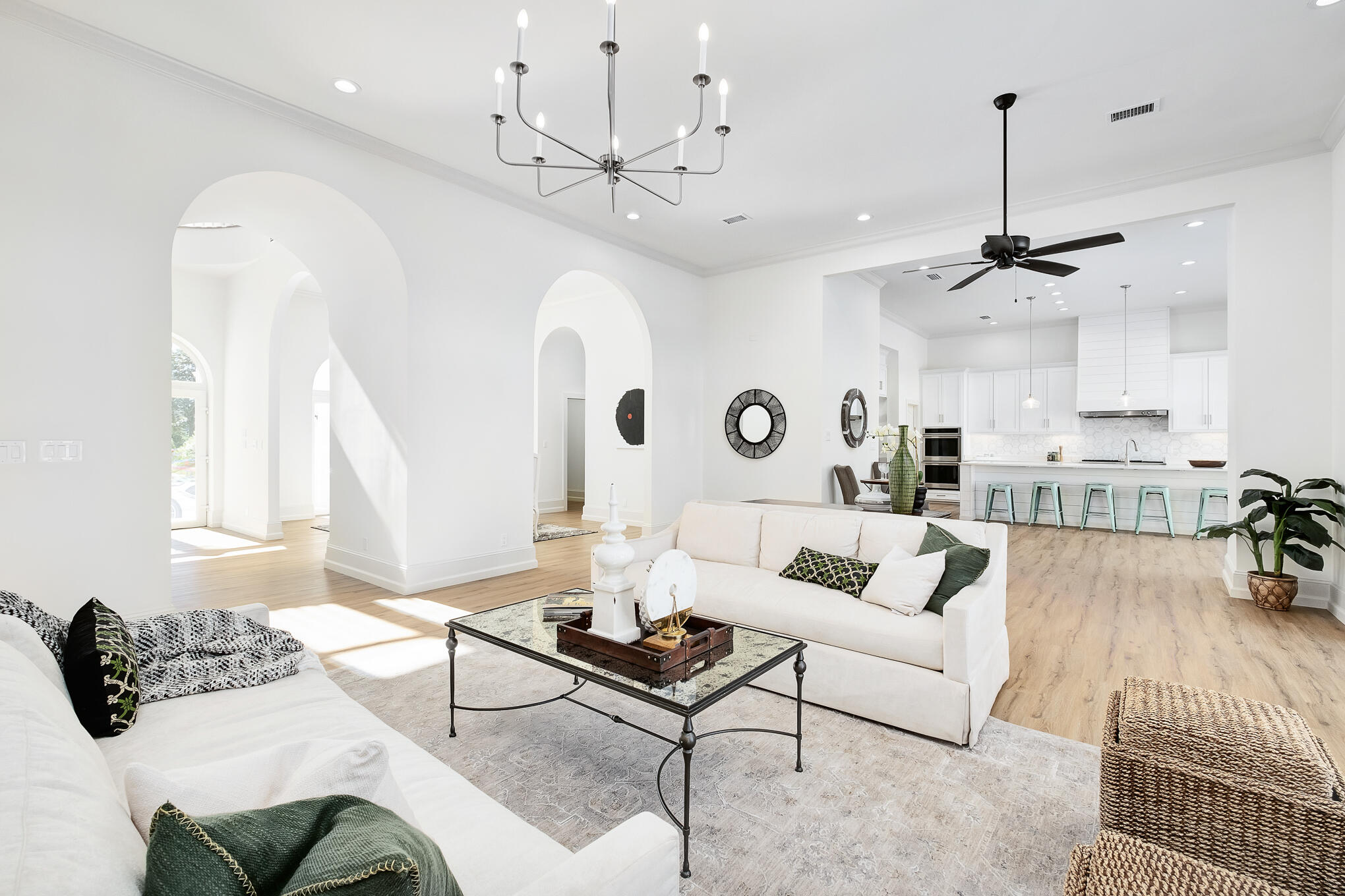 4105 Indian Trail Destin, FL 32541 - Photo 12 of 70 a living room with furniture or couch and a chandelier