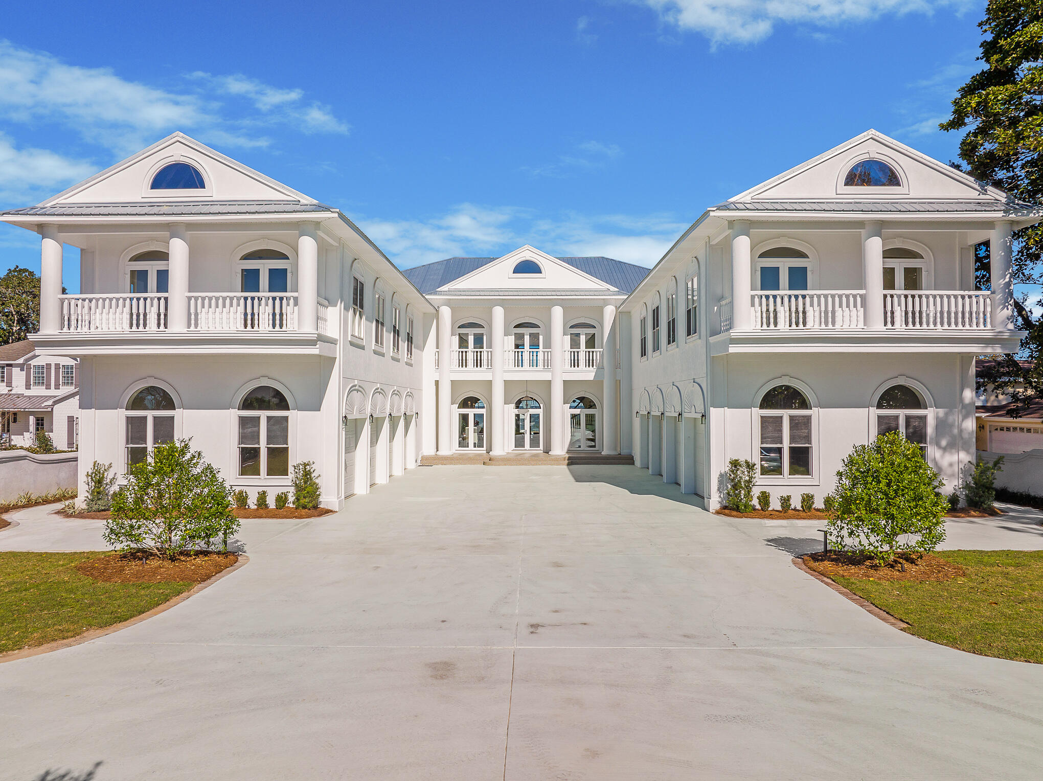 4105 Indian Trail Destin, FL 32541 - Photo 3 of 70 a front view of a house with a yard