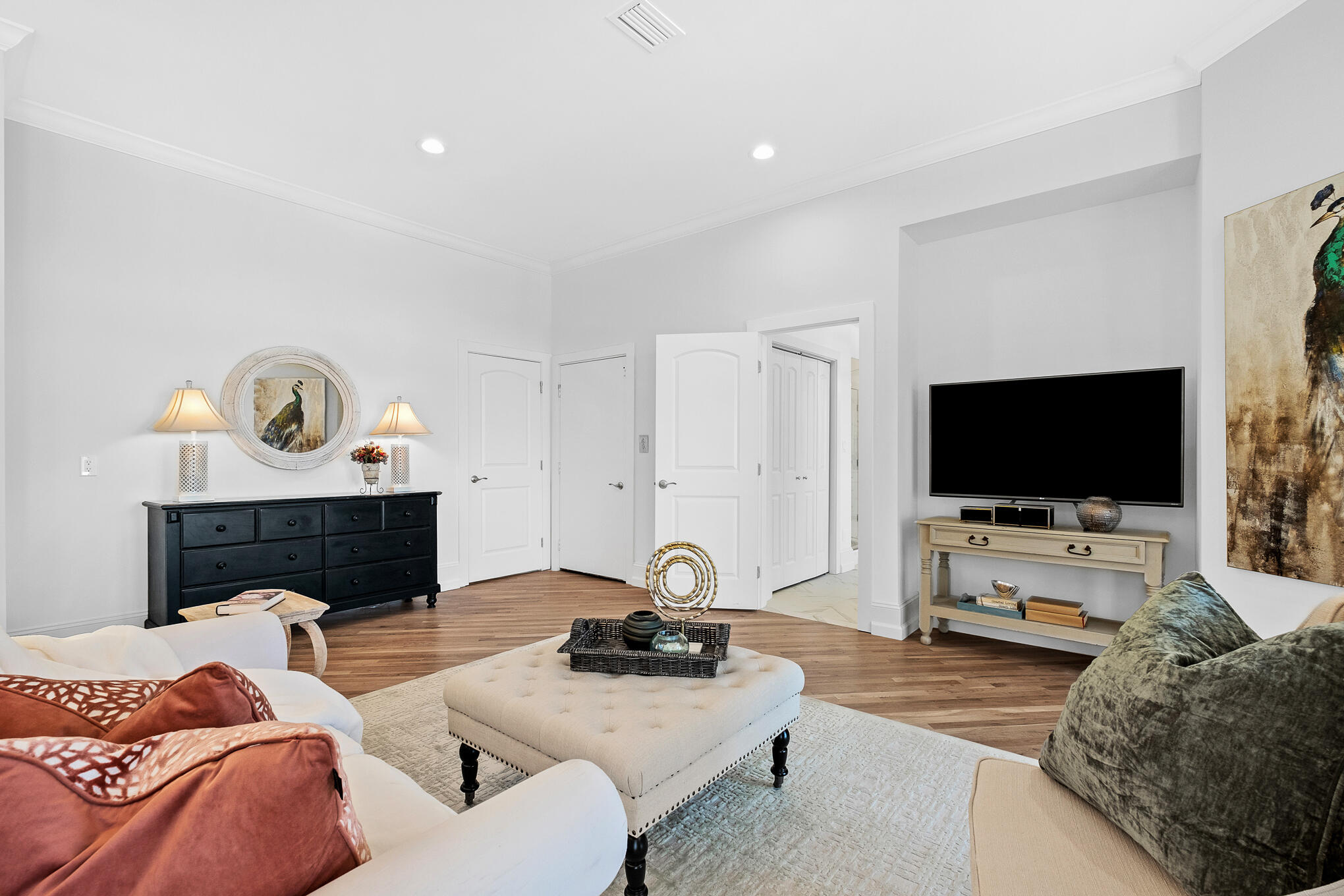 4105 Indian Trail Destin, FL 32541 - Photo 32 of 70 a living room with furniture a flat screen tv and a fireplace