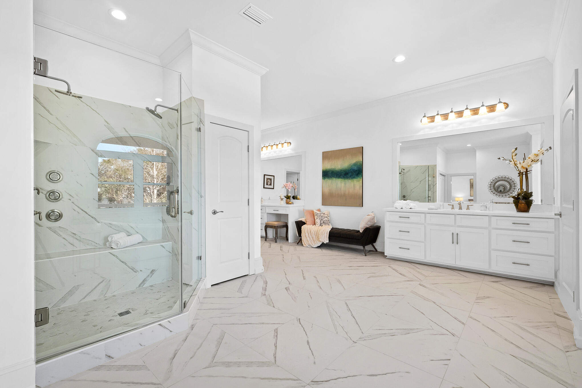 4105 Indian Trail Destin, FL 32541 - Photo 35 of 70 a bathroom with a glass door shower a sink and a mirror