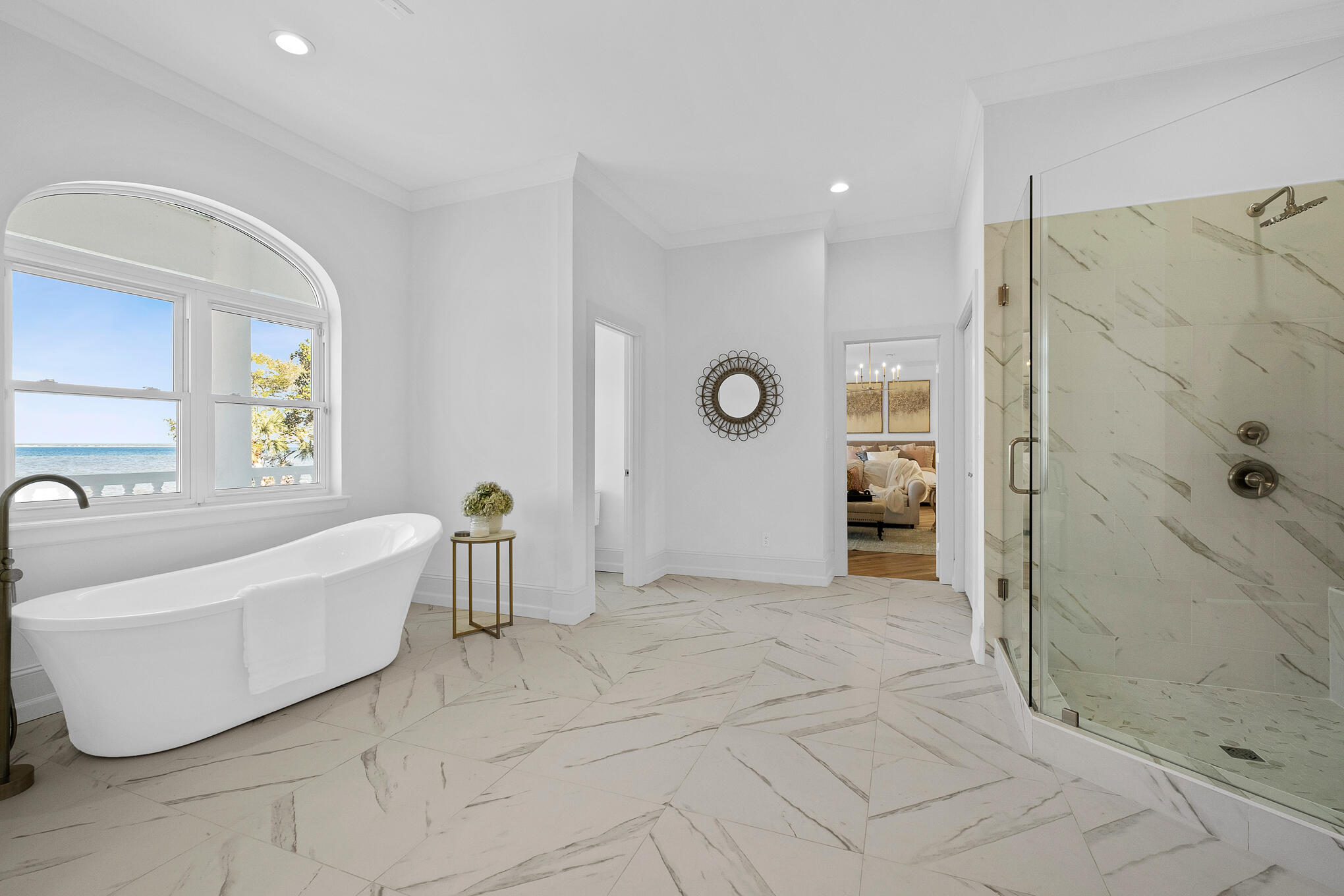 4105 Indian Trail Destin, FL 32541 - Photo 36 of 70 a bathroom with a tub a window and a shower