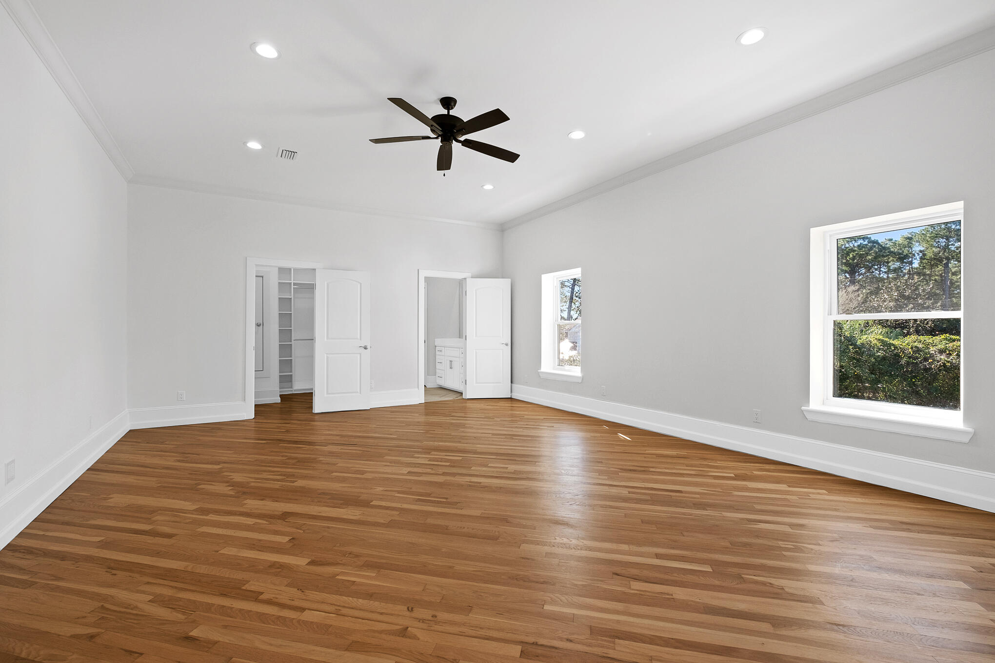 4105 Indian Trail Destin, FL 32541 - Photo 45 of 70 a view of an empty room with wooden floor and a window