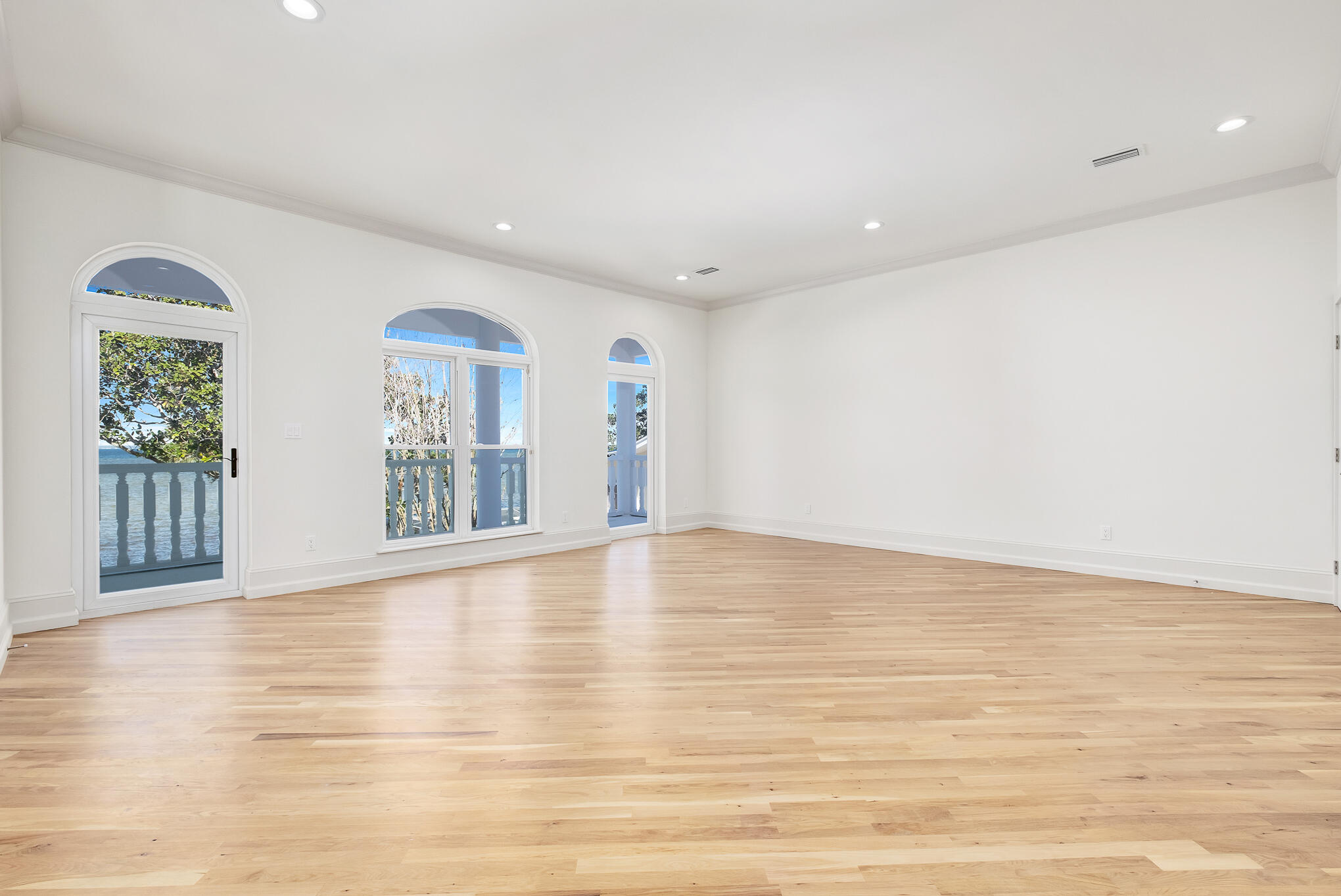 4105 Indian Trail Destin, FL 32541 - Photo 46 of 70 a view of an empty room with wooden floor and a window