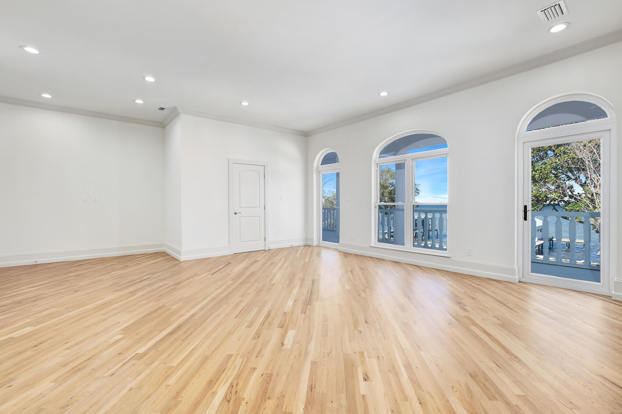 4105 Indian Trail Destin, FL 32541 - Photo 47 of 70 a view of an empty room with wooden floor and a window