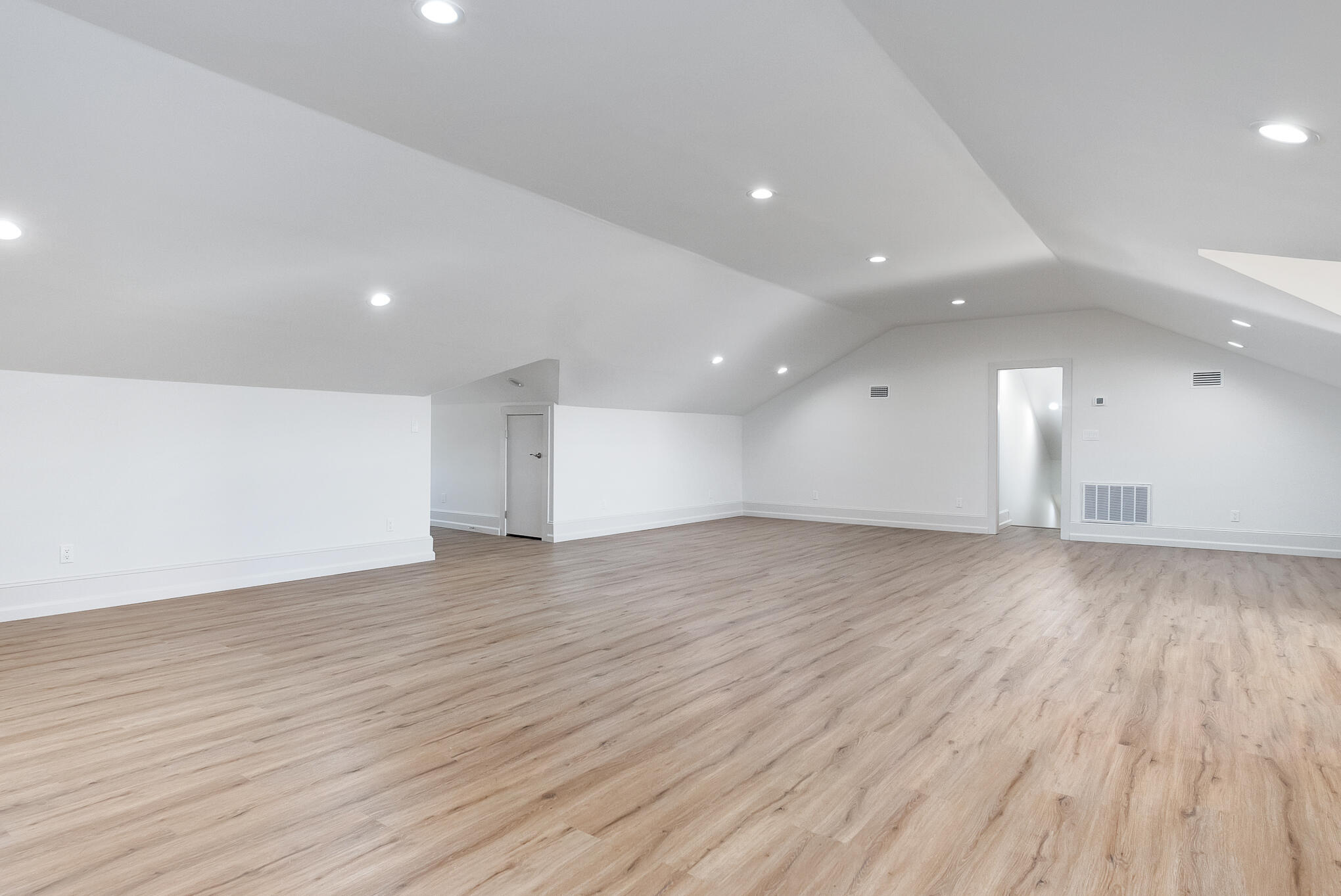 4105 Indian Trail Destin, FL 32541 - Photo 51 of 70 a view of an empty room with wooden floor and a window