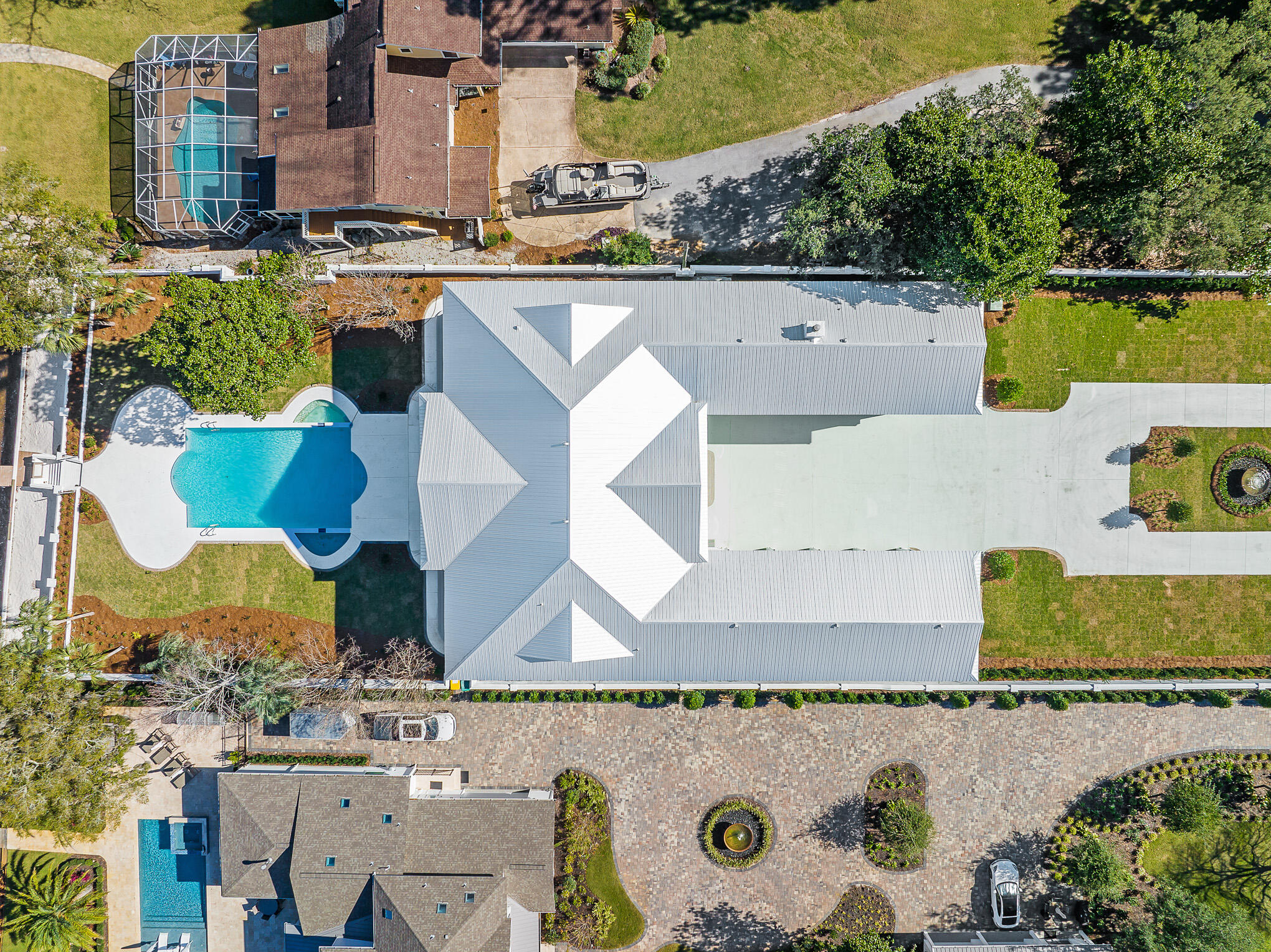 4105 Indian Trail Destin, FL 32541 - Photo 53 of 70 an aerial view of a house with a swimming pool