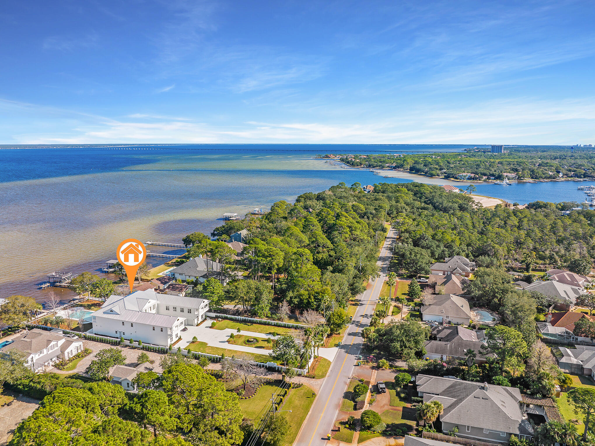 4105 Indian Trail Destin, FL 32541 - Photo 54 of 70 an aerial view of a house with a yard and lake view