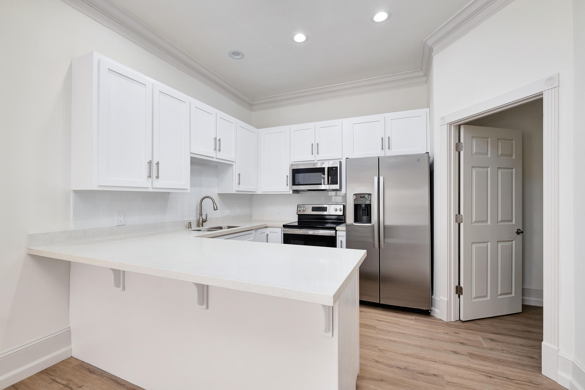 4105 Indian Trail Destin, FL 32541 - Photo 63 of 70 a kitchen with stainless steel appliances a refrigerator sink and microwave