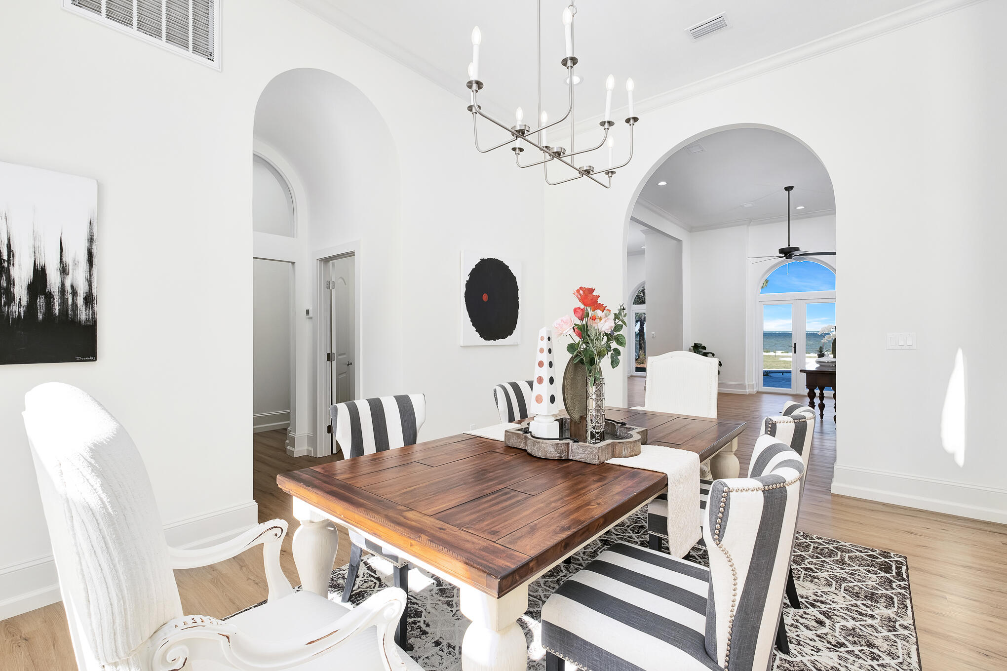 4105 Indian Trail Destin, FL 32541 - Photo 8 of 70 a view of a dining room with furniture and chandelier