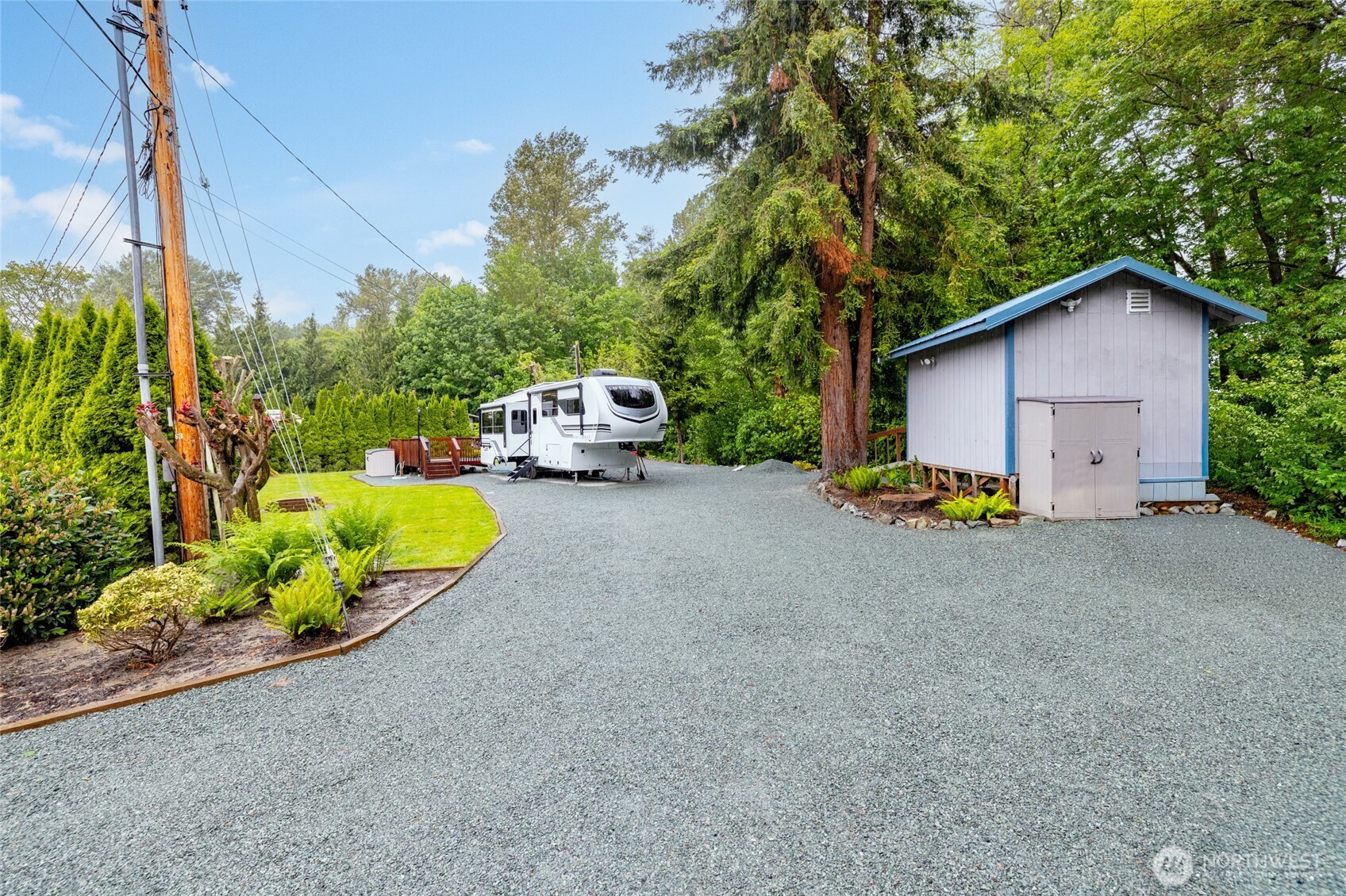 23801 Cove Road Sedro-Woolley, WA 98284 - Photo 13 of 34 a view of a house with backyard and entertaining space