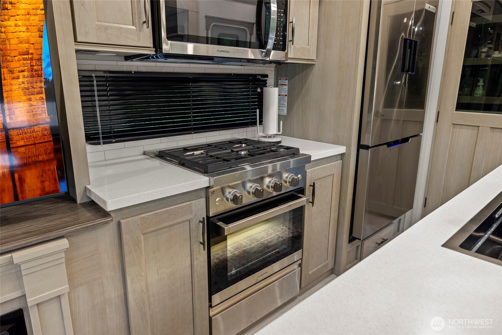 23801 Cove Road Sedro-Woolley, WA 98284 - Photo 23 of 34 a stove top oven sitting inside of a kitchen