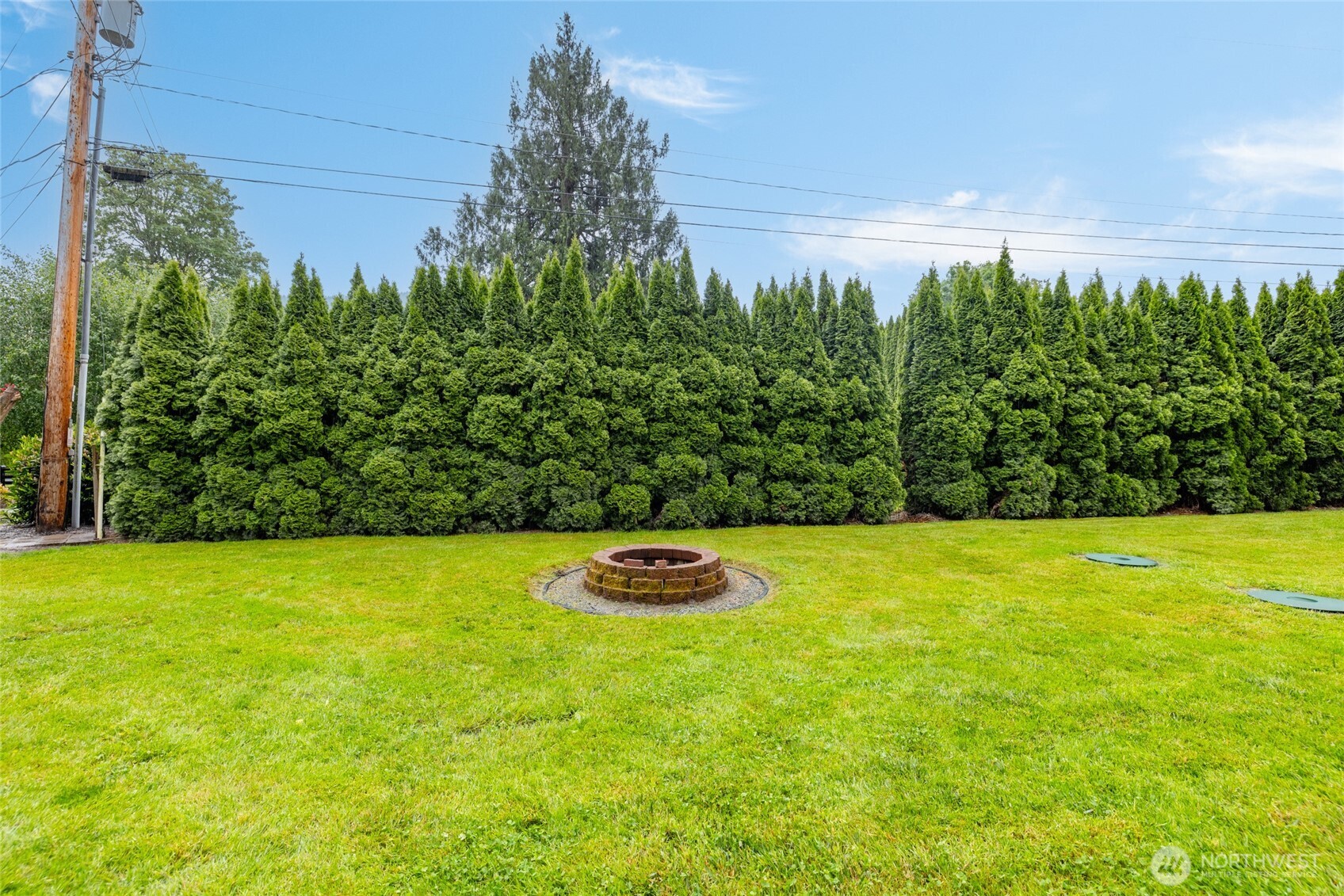 23801 Cove Road Sedro-Woolley, WA 98284 - Photo 6 of 34 a view of a yard and an ocean