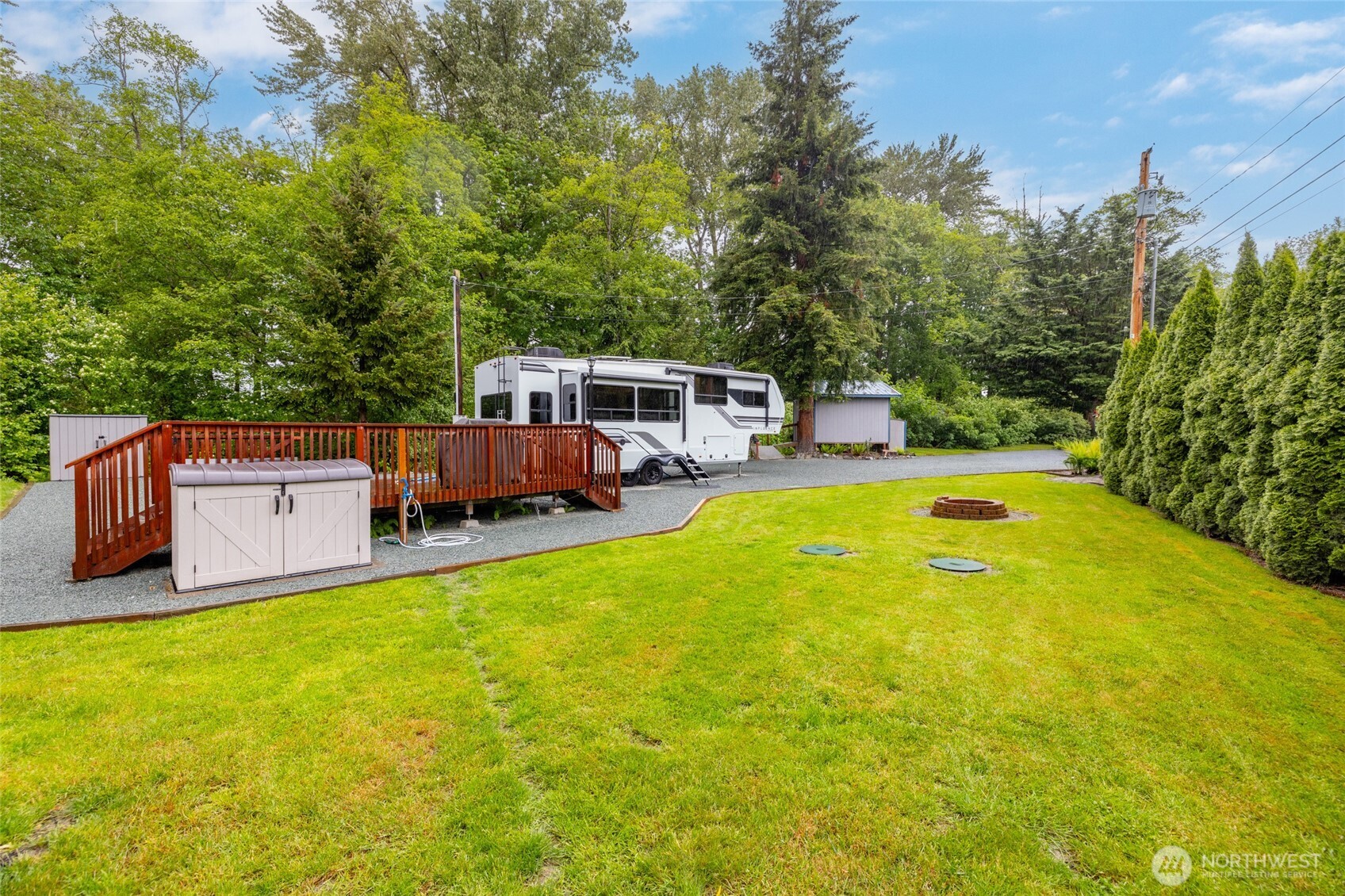 23801 Cove Road Sedro-Woolley, WA 98284 - Photo 7 of 34 a view of a swimming pool with a patio and yard