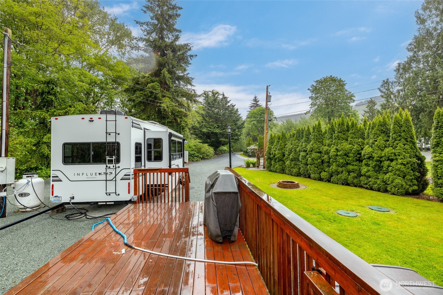 23801 Cove Road Sedro-Woolley, WA 98284 - Photo 8 of 34 a view of a swimming pool with a patio and a yard