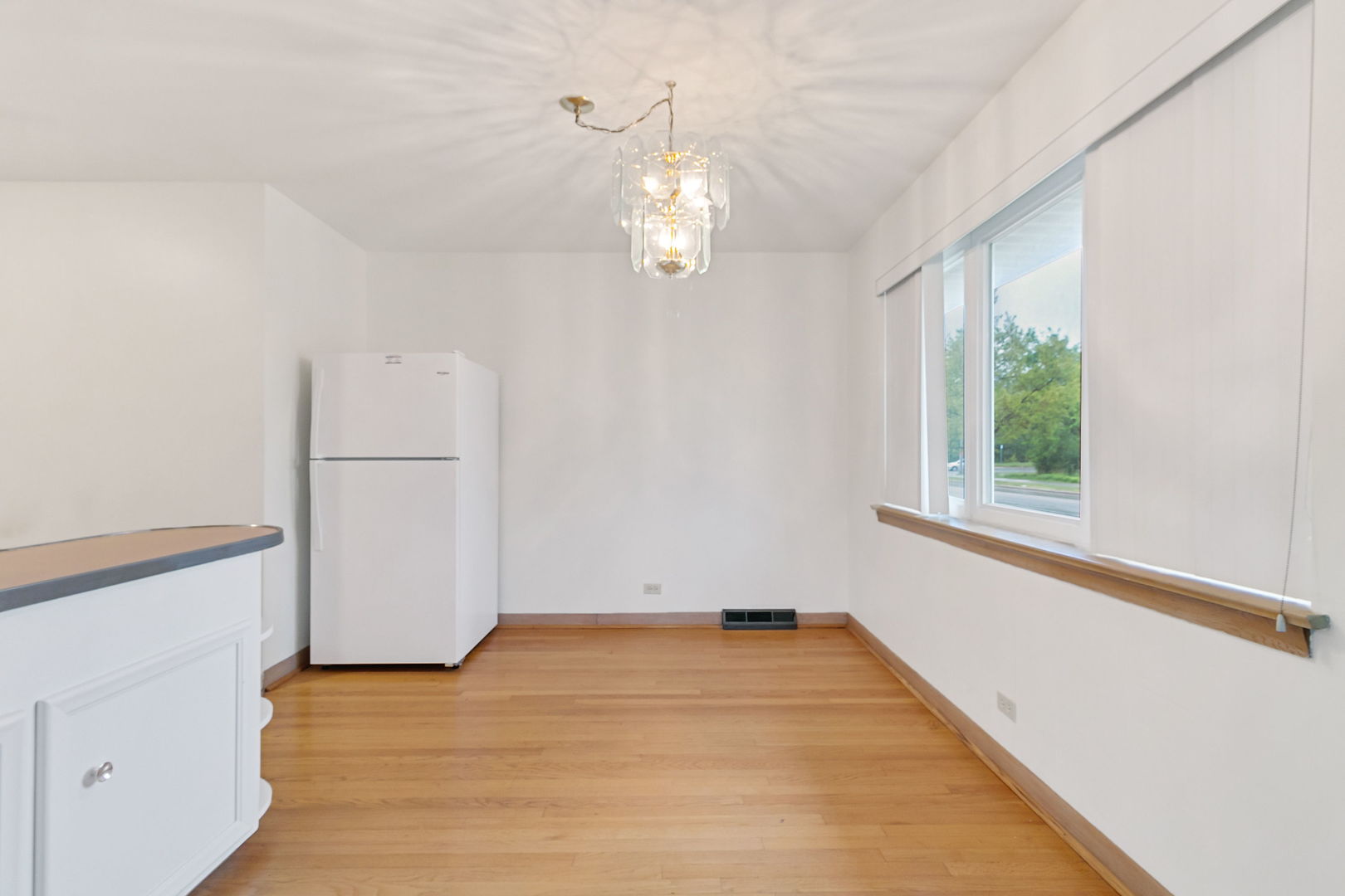2549 2nd Avenue North Riverside, IL 60546 - Photo 4 of 18 a view of empty room with wooden floor and fan