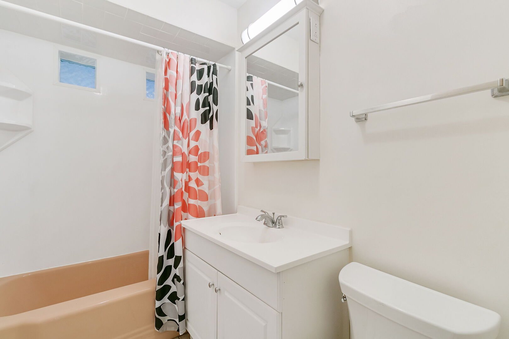 2549 2nd Avenue North Riverside, IL 60546 - Photo 8 of 18 a bathroom with a sink a toilet and shower curtain