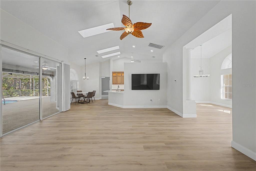 15031 Surrey Bend Spring Hill, FL 34609 - Photo 15 of 77 a view of a livingroom with a ceiling fan and window