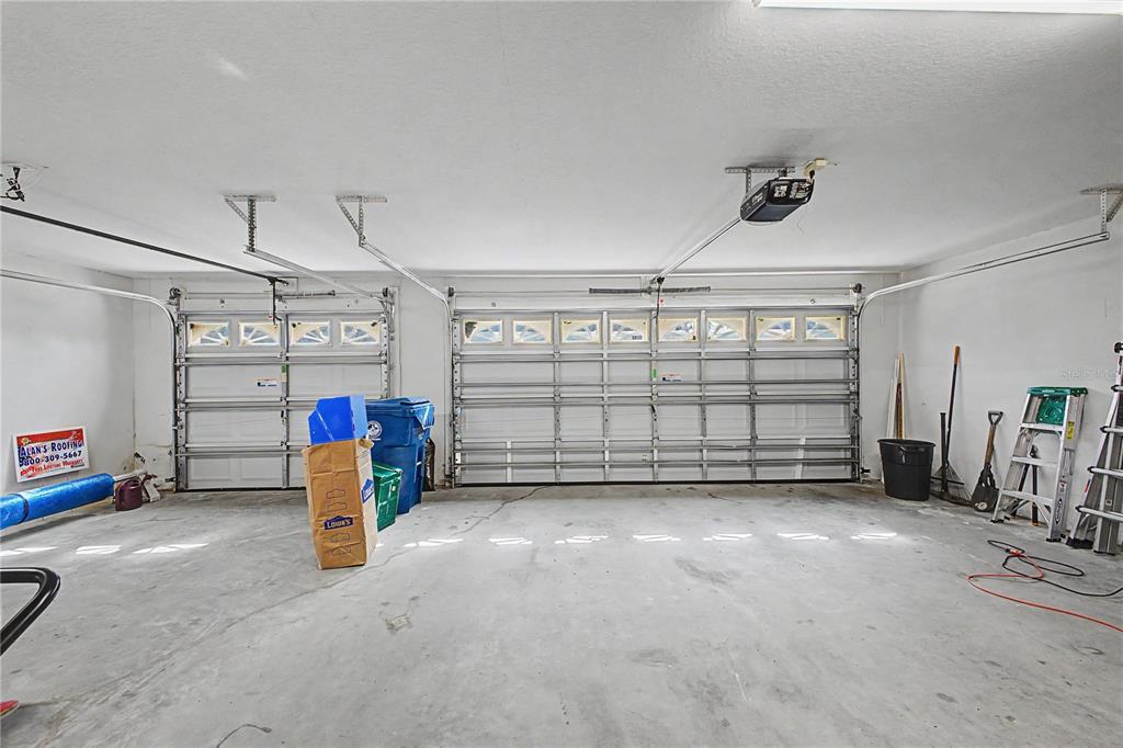 15031 Surrey Bend Spring Hill, FL 34609 - Photo 25 of 77 a view of a garage with storage