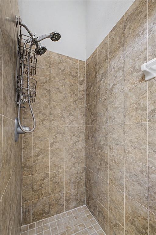 15031 Surrey Bend Spring Hill, FL 34609 - Photo 42 of 77 a bathroom with a shower
