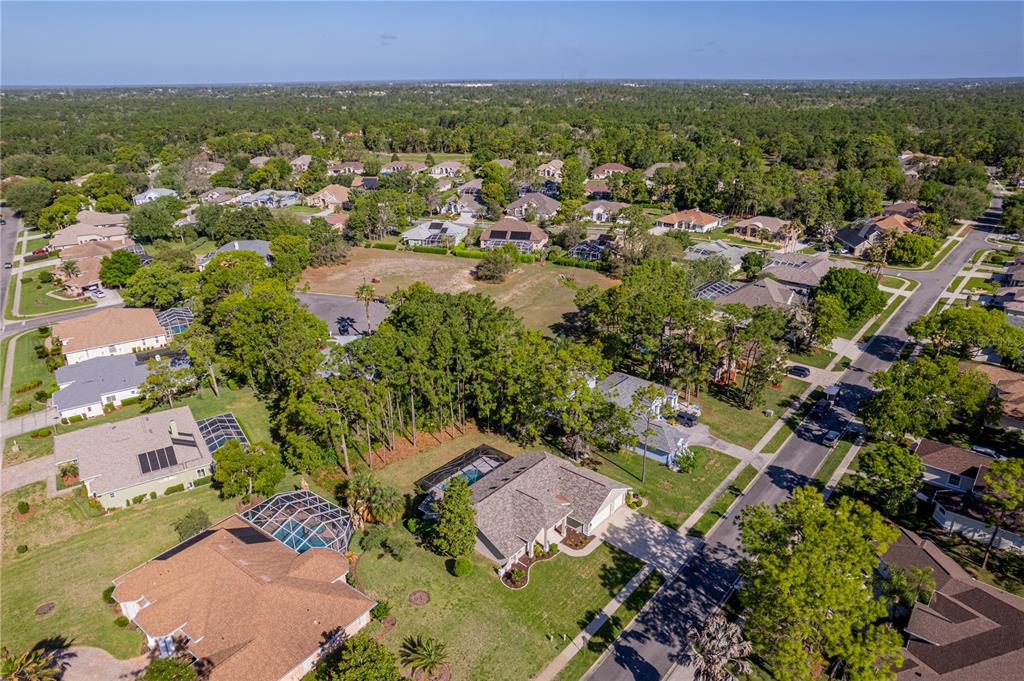 15031 Surrey Bend Spring Hill, FL 34609 - Photo 62 of 77 an aerial view of residential house with outdoor space