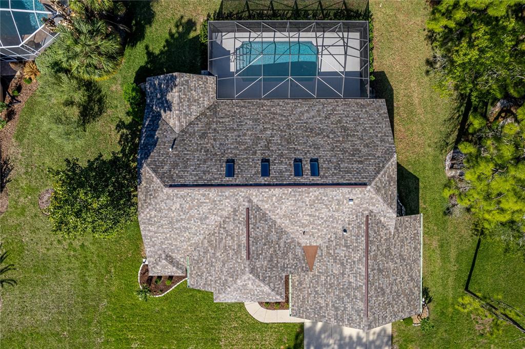 15031 Surrey Bend Spring Hill, FL 34609 - Photo 77 of 77 an aerial view of a house with a yard