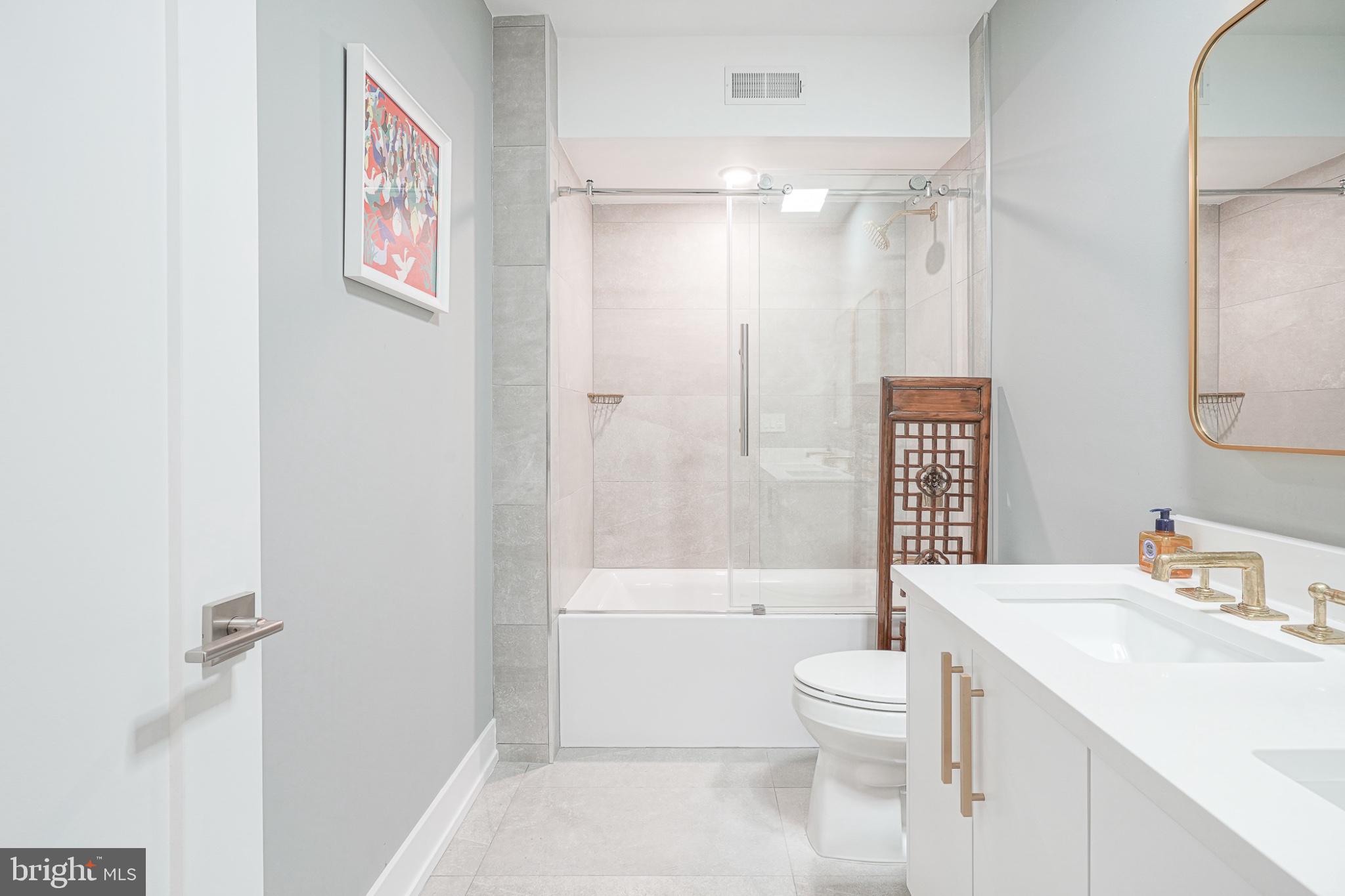 622 South Clarion Street Philadelphia, PA 19147 - Photo 33 of 57 Sleek modern bathroom with elegant touches.