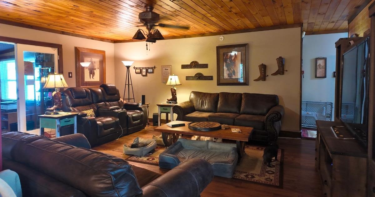 772 Rushing Road Michie, TN 38357 - Photo 2 of 19 Living space featuring wood-finish flooring and a wood-paneled ceiling