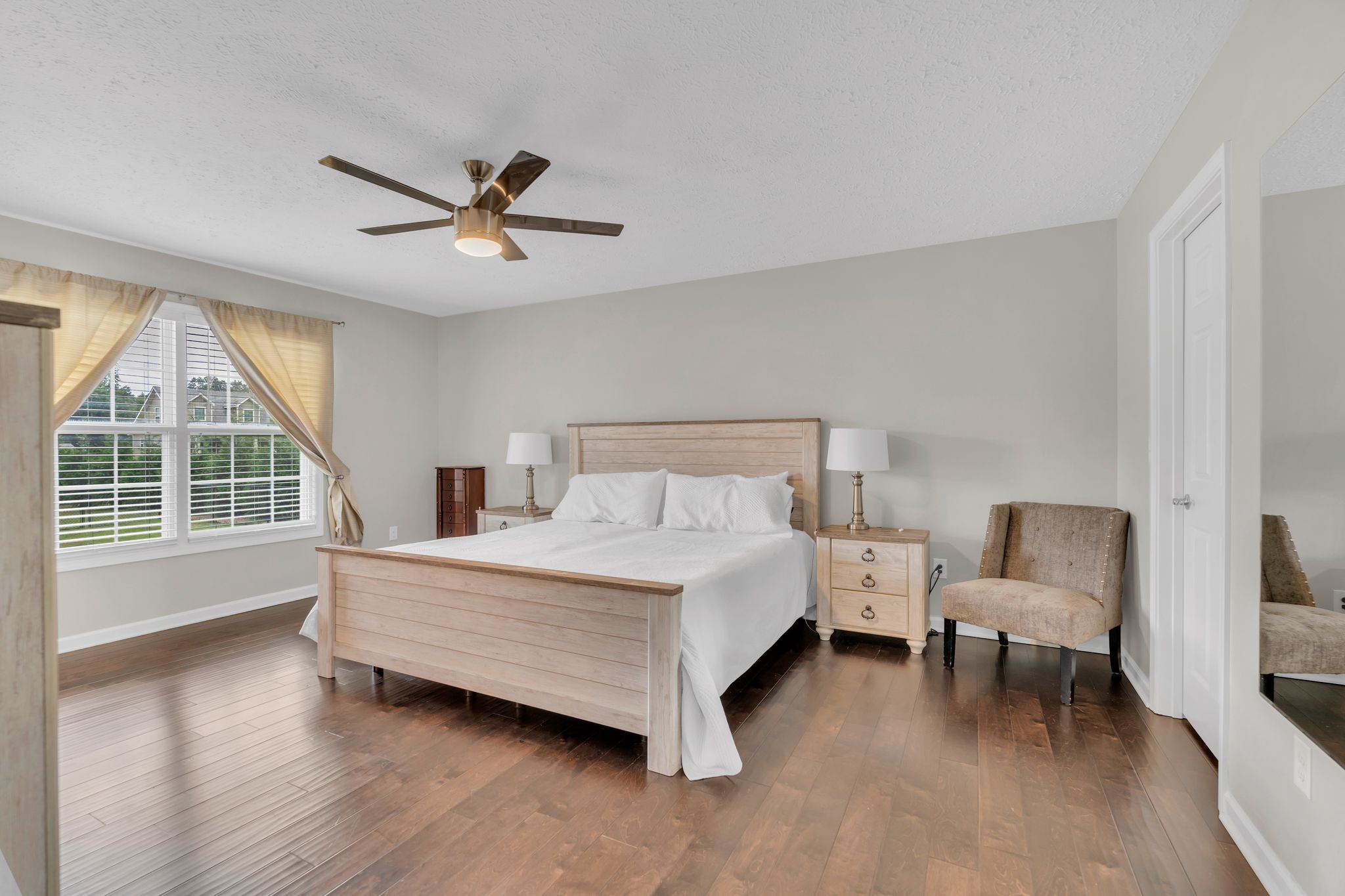 124 Houston Bell Road Manchester, TN 37355 - Photo 18 of 43 a bedroom with a bed and a large window