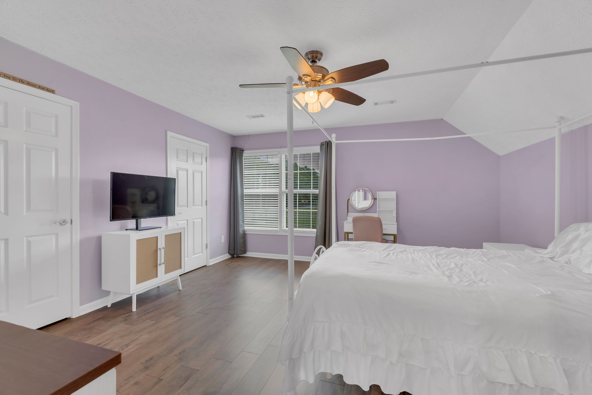 124 Houston Bell Road Manchester, TN 37355 - Photo 25 of 43 a bedroom with a bed and a flat screen tv