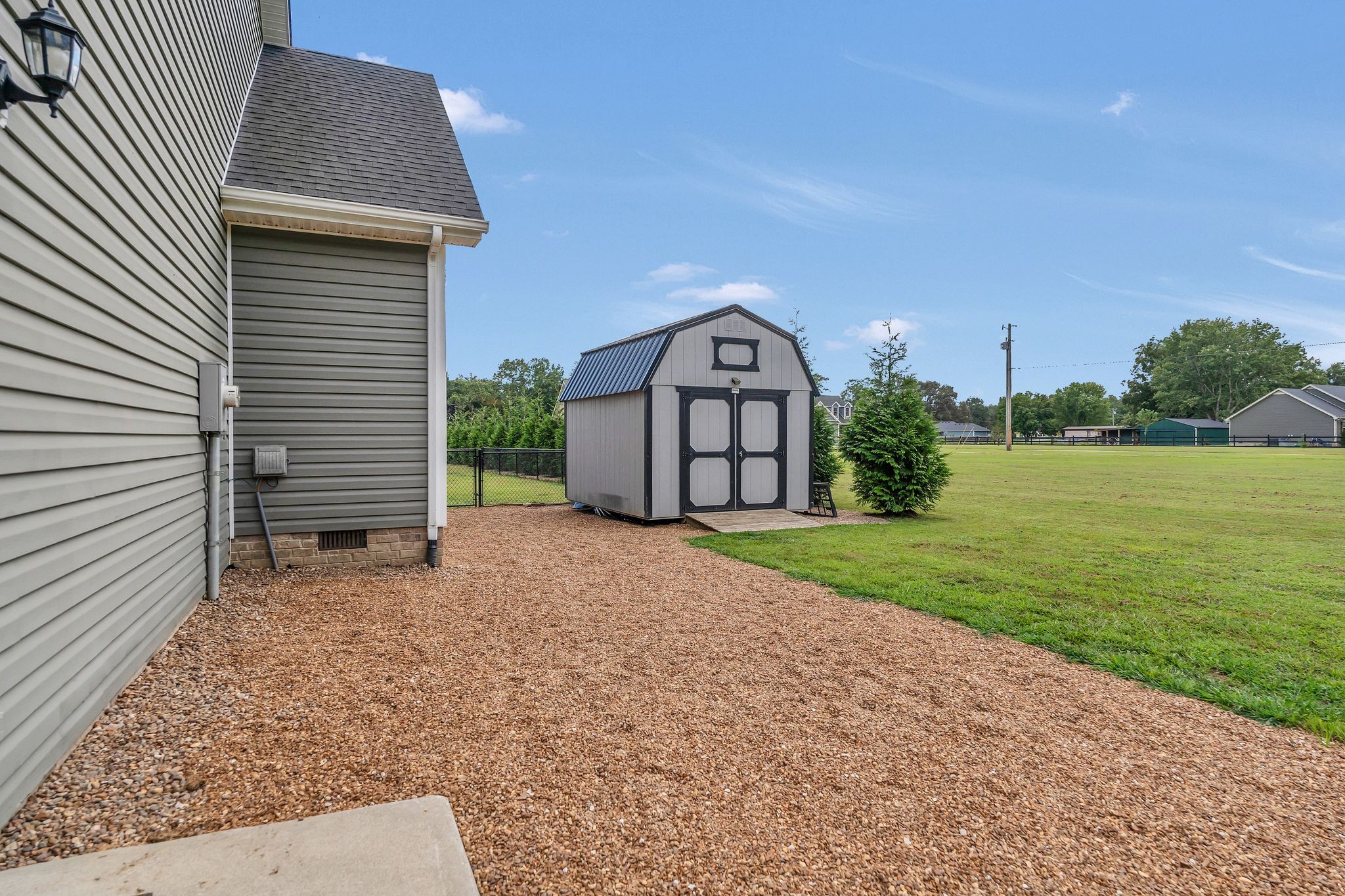 124 Houston Bell Road Manchester, TN 37355 - Photo 34 of 43 a view of a back yard of the house