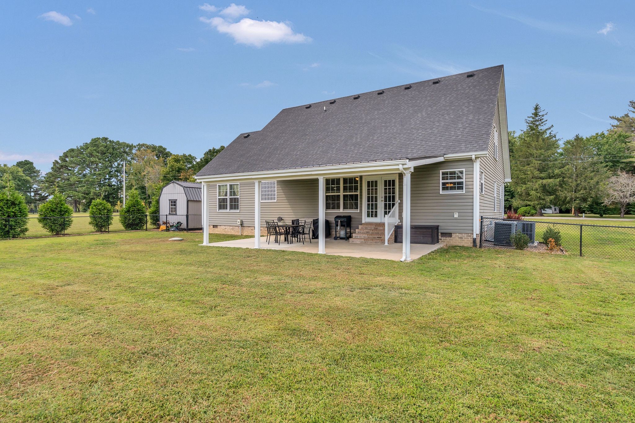 124 Houston Bell Road Manchester, TN 37355 - Photo 40 of 43 a view of a house with a backyard