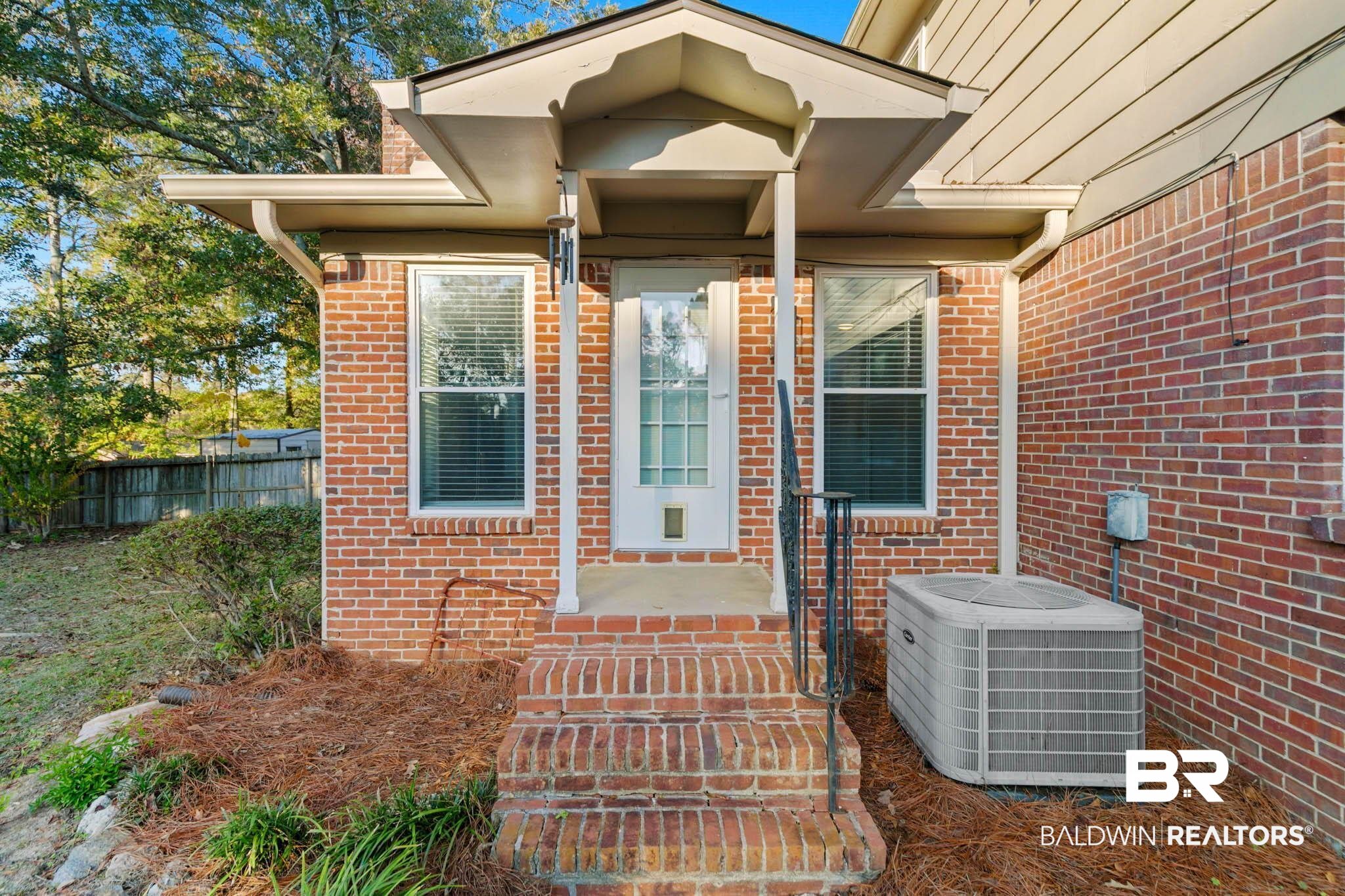 608 Southern Way Daphne, AL 36527 - Photo 34 of 35 Entrance to property featuring brick siding