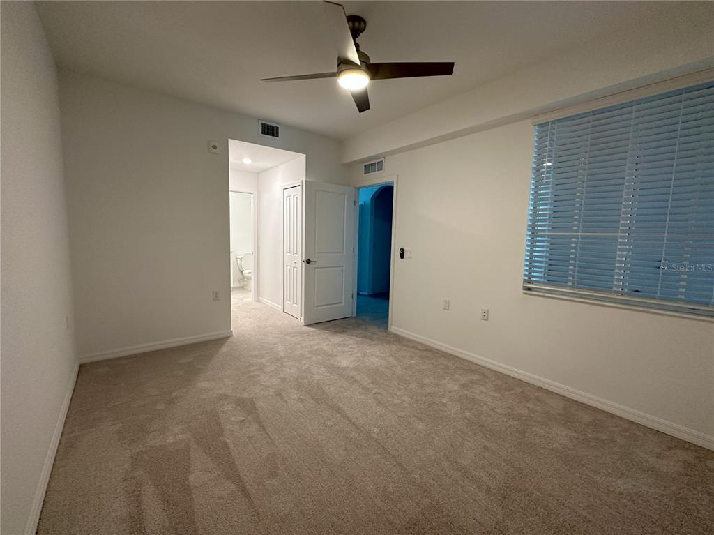 14131 Heritage Landing Boulevard, Unit 822 Punta Gorda, FL 33955 - Photo 11 of 51 a view of empty room with ceiling fan