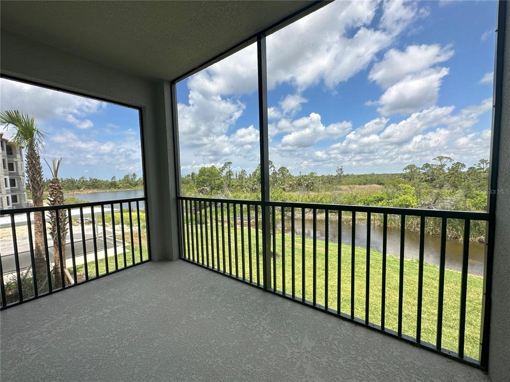 14131 Heritage Landing Boulevard, Unit 822 Punta Gorda, FL 33955 - Photo 22 of 51 a view of city from a balcony