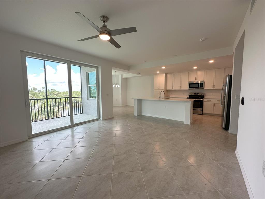 14131 Heritage Landing Boulevard, Unit 822 Punta Gorda, FL 33955 - Photo 9 of 51 a view of a kitchen with a stove