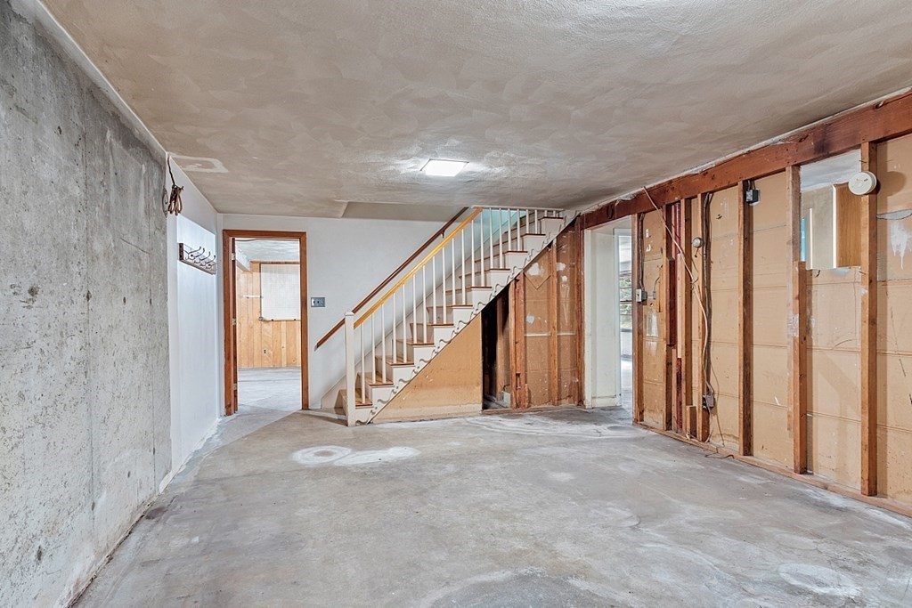911 Main Street Reading, MA 01867 - Photo 29 of 42 a view of an entryway with staircase