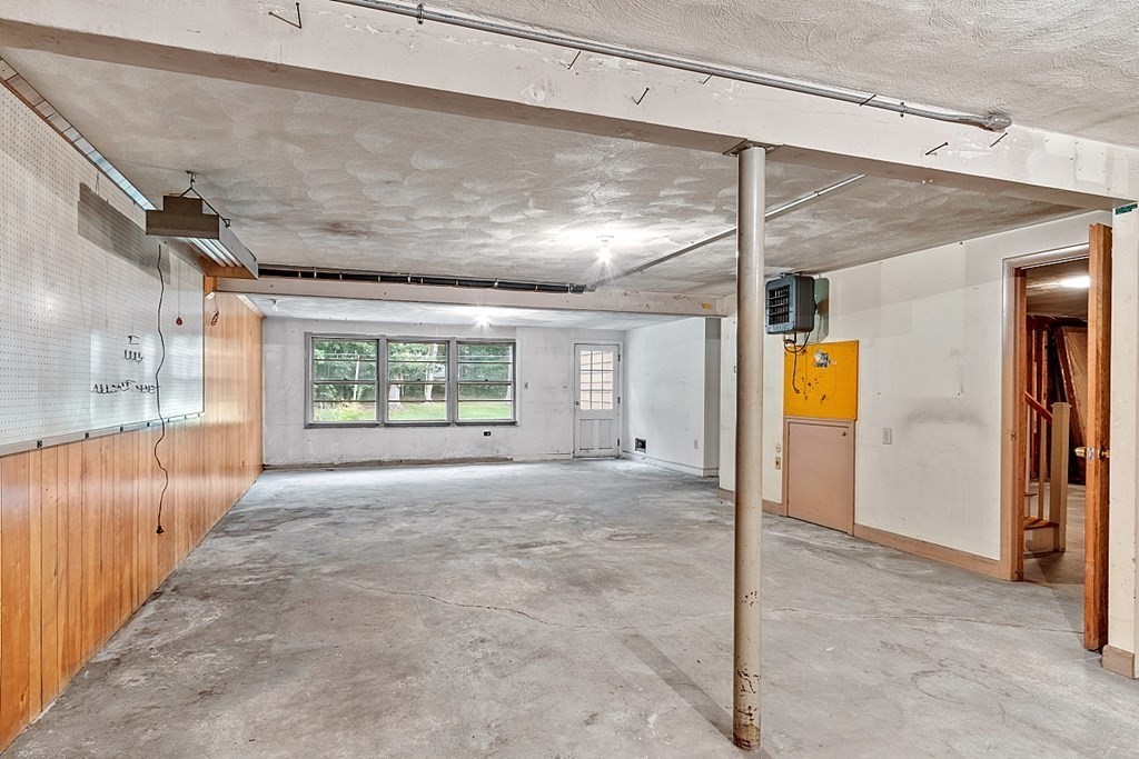 911 Main Street Reading, MA 01867 - Photo 31 of 42 a view of an empty room with a window