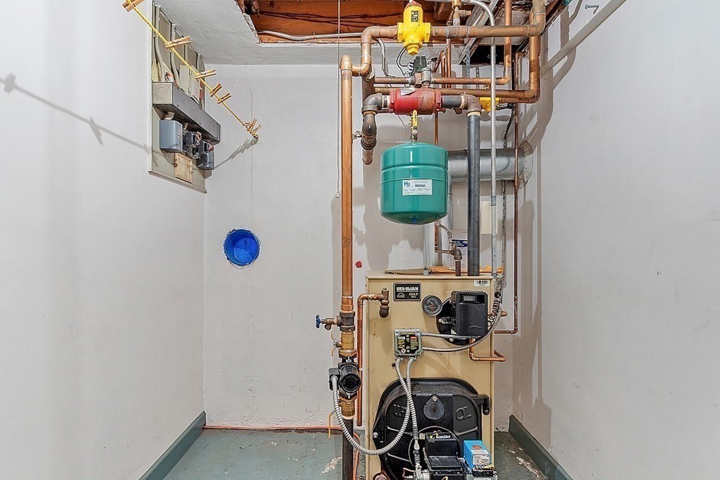 911 Main Street Reading, MA 01867 - Photo 35 of 42 a view of storage and utility room