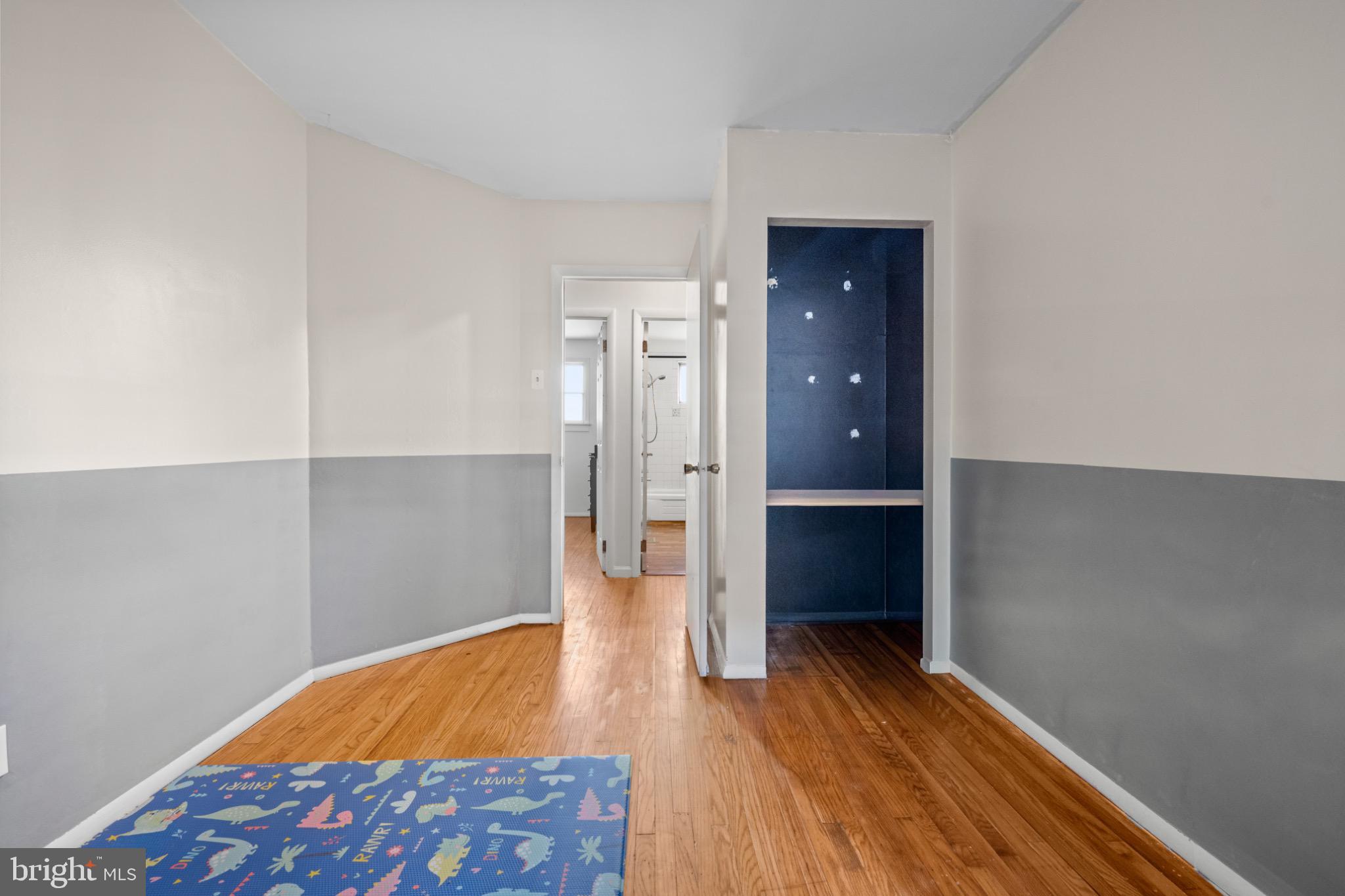 53 Jobs Lane Williamstown, NJ 08094 - Photo 19 of 32 a view of an empty room with wooden floor and closet