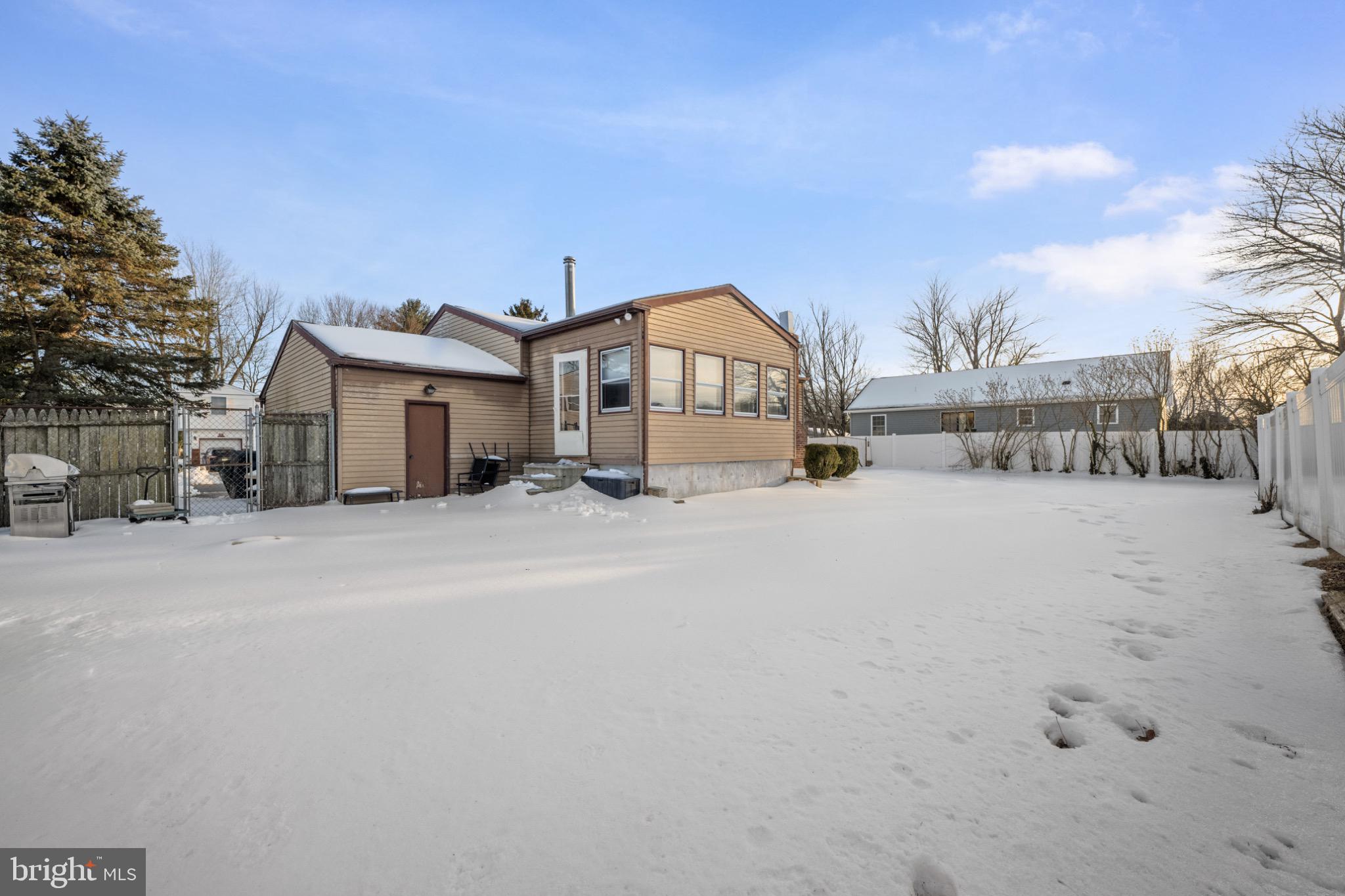 53 Jobs Lane Williamstown, NJ 08094 - Photo 29 of 32 a view of a house with a snow in the yard