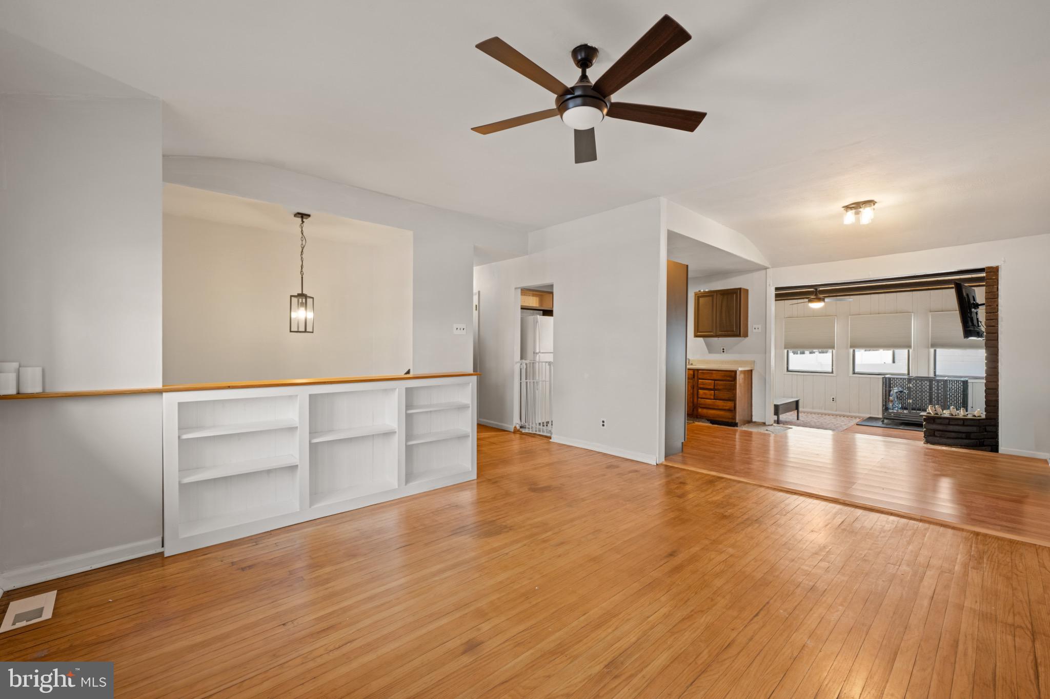 53 Jobs Lane Williamstown, NJ 08094 - Photo 5 of 32 a view of a livingroom with wooden floor and a ceiling fan