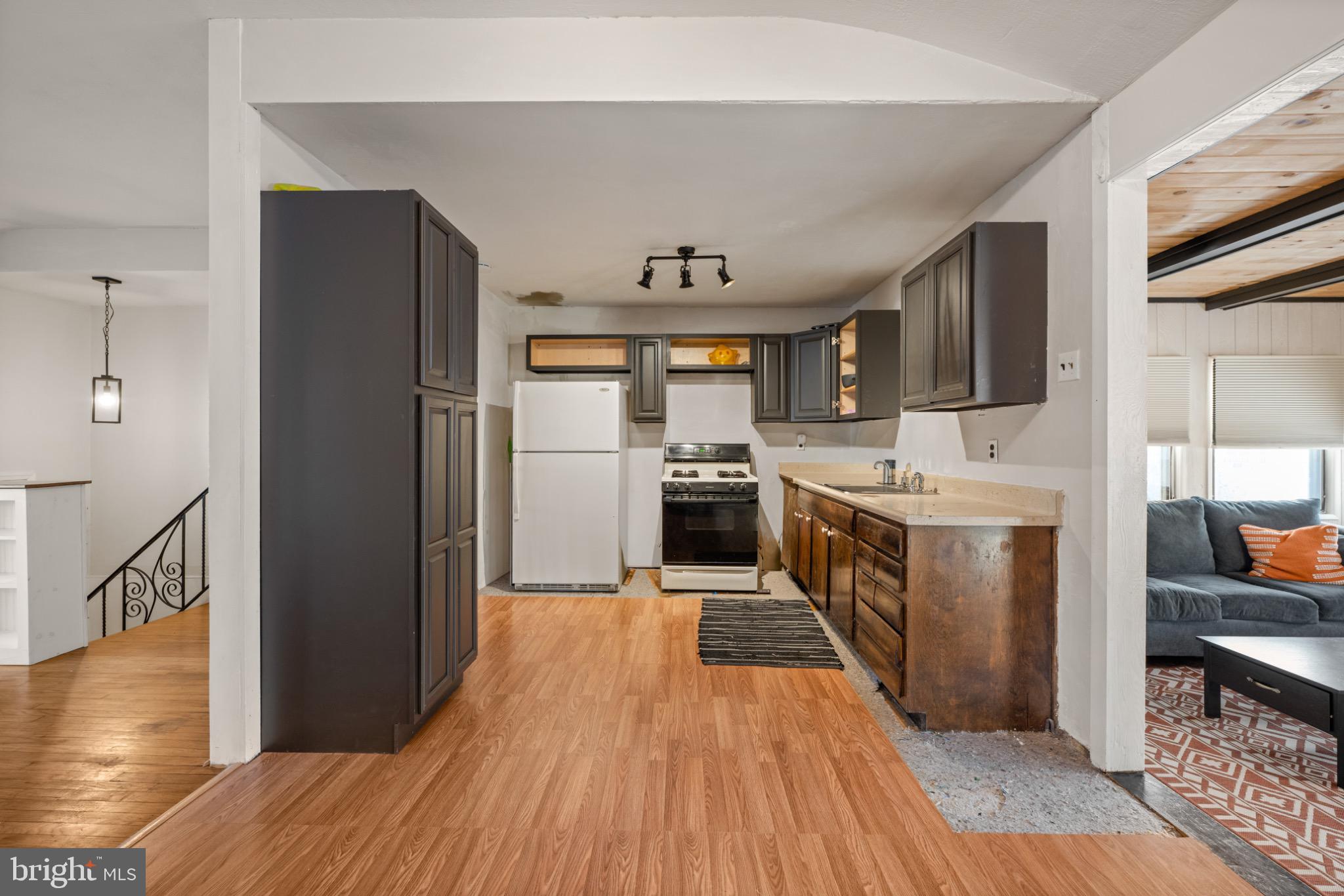 53 Jobs Lane Williamstown, NJ 08094 - Photo 8 of 32 a kitchen with stainless steel appliances a sink and a refrigerator