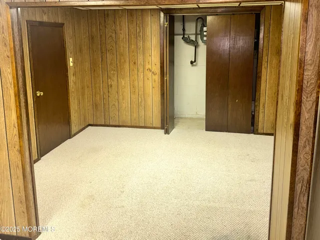 a bathroom with a glass door