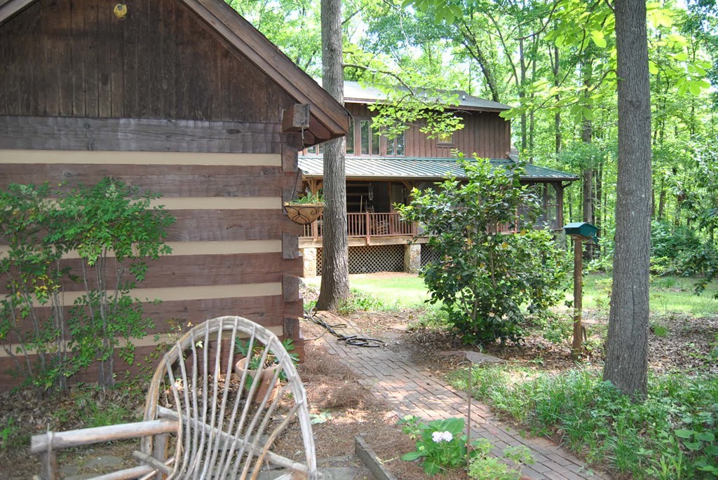 249 Bolingview Road Juliette, GA 31046 - Photo 11 of 45 a view of house with a yard and sitting area