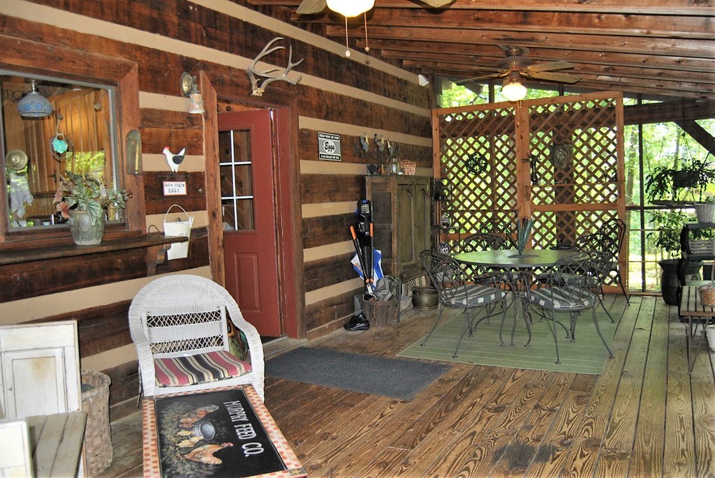 249 Bolingview Road Juliette, GA 31046 - Photo 18 of 45 a view of a porch with furniture and front door