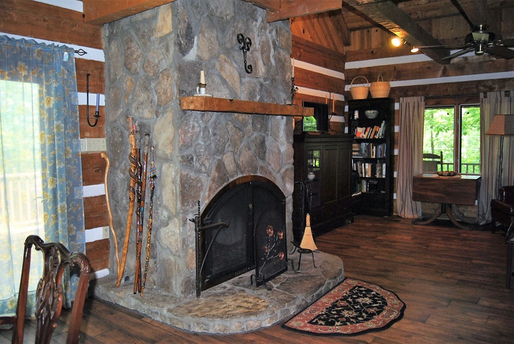 249 Bolingview Road Juliette, GA 31046 - Photo 19 of 45 a living room with furniture and a fireplace