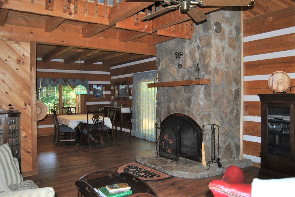 249 Bolingview Road Juliette, GA 31046 - Photo 20 of 45 a living room with furniture and a fireplace