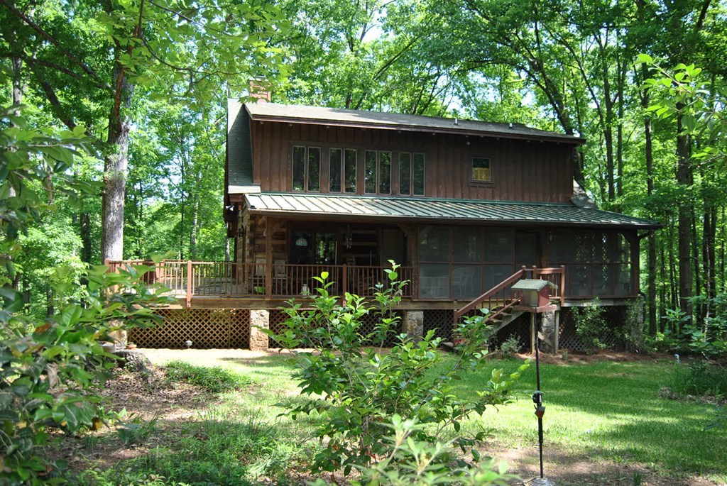 249 Bolingview Road Juliette, GA 31046 - Photo 3 of 45 a front view of a house with a garden
