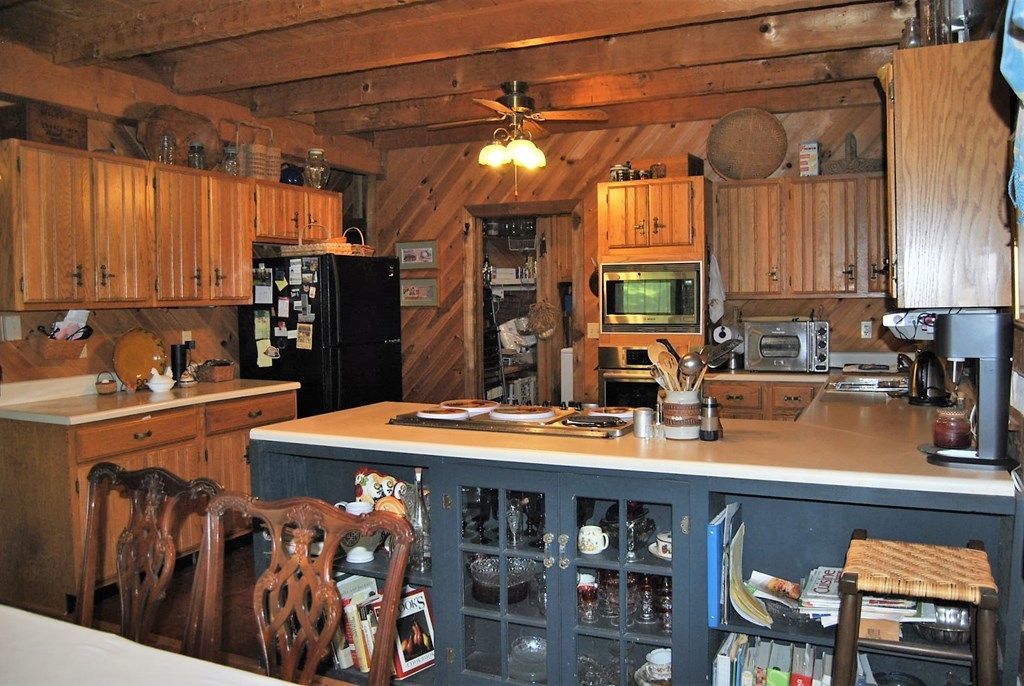 249 Bolingview Road Juliette, GA 31046 - Photo 23 of 45 a view of a kitchen with kitchen island granite countertop a sink appliances and cabinets